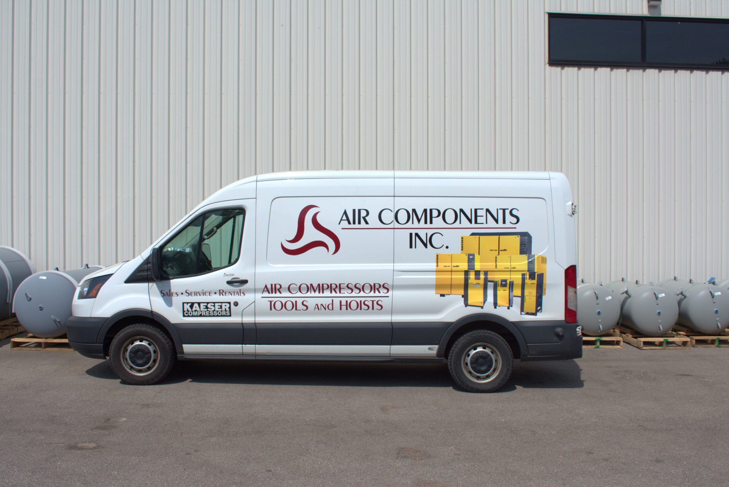 An Air Components van, fully equipped and ready to assist with lifting tools and other essential equipment. 